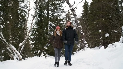 Sequence of Shots of Affectionate Couple Hiking in Winter 動画素材 108112140