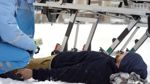 Sequence of Shots of Paramedics Loading Patient into Ambulance Video stock 123690702