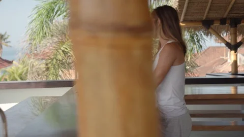 Sequence of Shots of Woman Doing Remote Job on Tropical Vacation Stock-Footage 120454845