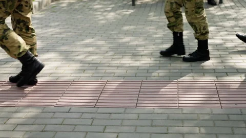 A sequence showing the progression from an empty pedestrian pathway lined with Video stock 312679015