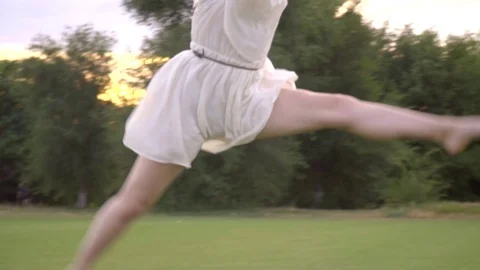 Sequence slow motion jump ballerina girl Japanese Stock Footage 77342790