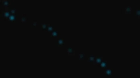 A sequence of soft blue glowing light orbs arranged on a dark background Stock Footage 339617509