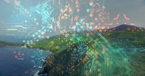 On sequence start circuit overlay appearing over coastal cliff, nodes pulsing, Video stock 334316071