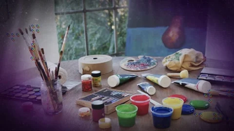 At sequence start tabletop art supplies remaining still while overlays float and Stock Footage 333154913