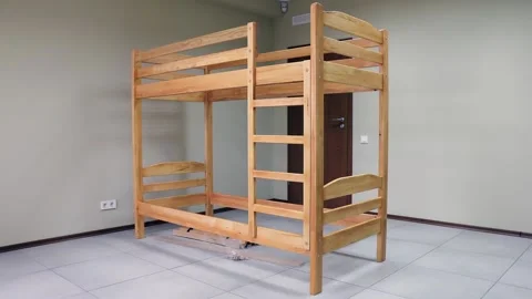 Sequential assembly of a Bunk wooden bed Stock Footage 197381569