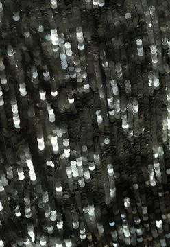 Sequin fabric texture background. Black color fabric, festive background Stock Photos