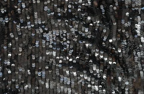Sequin fabric texture background. Black color fabric, festive background Stock Photos