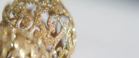 Sequined shallow bauble details anamorphic 5.7K sliding video Stock Footage 316205732