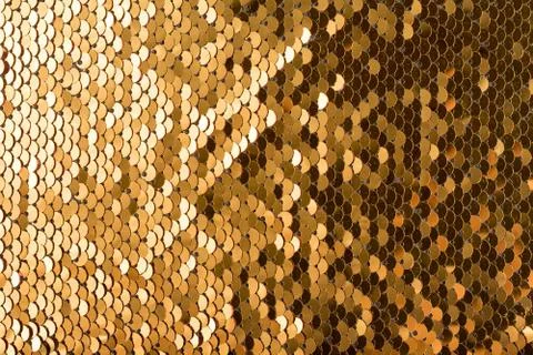 Sequins background. Background with shiny sequins on fabric.  Stock Photos