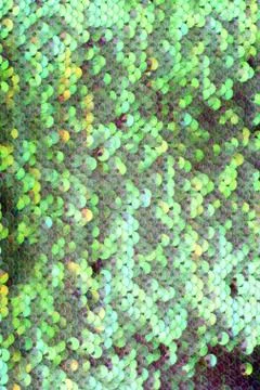 Sequins background. Background with shiny sequins on fabric.  Stock Photos