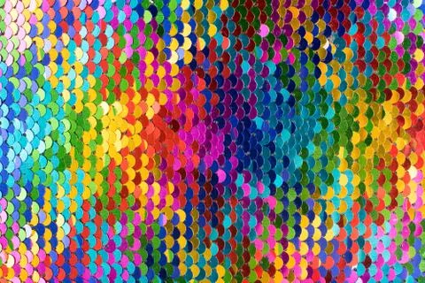 Sequins background. Multicolored sequins.Background with shiny sequins on fabric Stock Photos