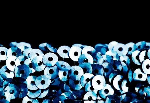 Sequins close-up macro. Abstract background with blue sequins color 库存照片