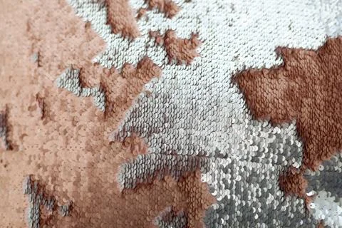 Sequins close-up macro. Abstract background with gold sequins color on the fa Foto stock