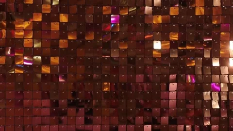 Sequins moving in the wind on the wall. The brilliance of their movement. H.. Stock Footage 332212048