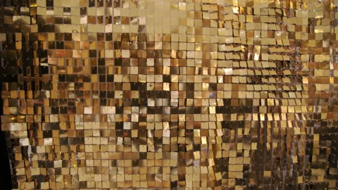Sequins reflective golden background, Sparkling. Wide shot Stock Footage 239659604