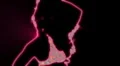ser-11 - neon outlined gogo dancer silhouette in red with light rays HD Footage