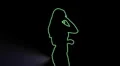 ser-28 - neon outlined gogo dancer silhouette in green with light rays HD Footage