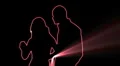 ser-31 - neon outlined dance couple silhouette in red with light rays HD Footage