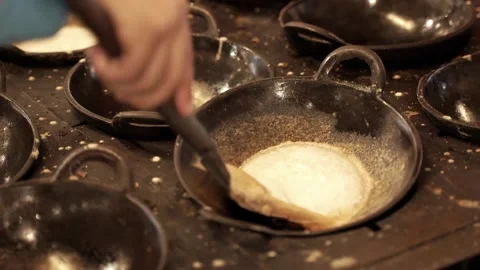 Serabi is being removed from the steamer, typical Indonesian food serabi Stock Footage 272298448