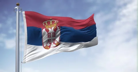 Serbia national flag waving in the wind on a clear day Stock Footage 253561053