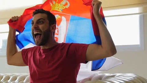 Serbian Fan Celebrating at Home Stock Footage 87178053