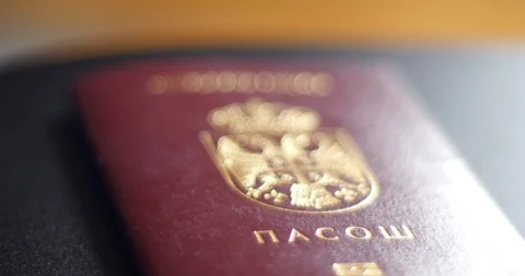 Serbian passport, taking off the table 스톡 동영상 126293831