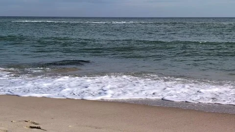 Serene 4K Sea Surface with Small Rippling Waves Vídeos de archivo 327793299