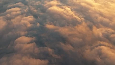 A Serene Aerial Cloudscape Captured at Sunset for All to Admire Stock Footage 319951575