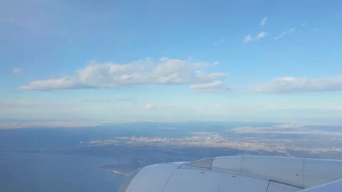 Serene Airplane Window View with Wing, Clouds, and Engine Sound | HD Video Stock Footage 298144777