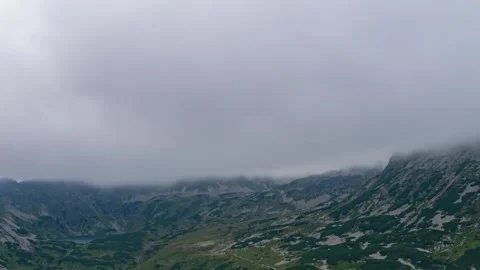 Serene Alpine Lake in Tatra Range - Cloud Dynamics Timelapse Stock Footage 308188597