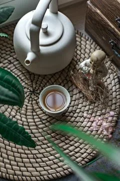 A Serene and Calming Tea Setup with Beautiful Decorative Elements and Indoor Stock Photos