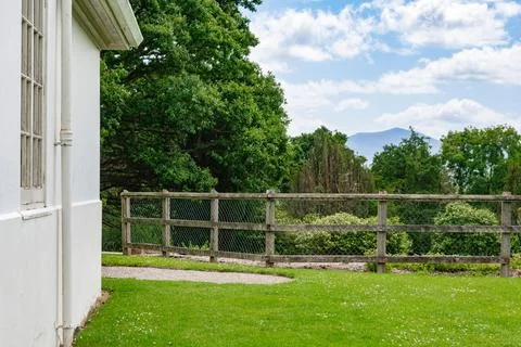 A Serene and Peaceful View of Nature from the White Houses Inviting and Lush Stock Photos