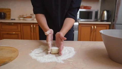 Serene Bakery Scene With Hands Working And Dough Rising Smoothly Видео 329063483