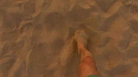 Serene Barefoot Stroll At Sunset Shore. Gentle Footprints Left In Warm Summer 库存影片 337939298