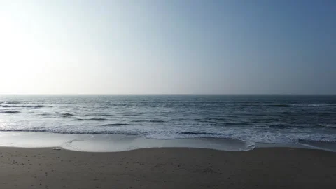 Serene Beach with Waves, Clear Sky, and Nature’s Beauty, North Sea, Winter Vídeos de archivo 285074468