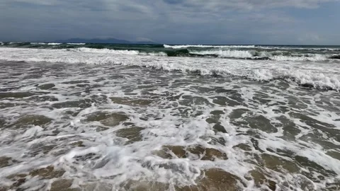 Serene Beach Waves Under Clouds Stock Footage 290080706