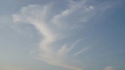 Serene Blue Sky with Delicate Wispy Cirrus Clouds 写真素材