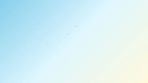 A serene blue sky with a flock of distant birds flying in the bright light Stock Footage 335145889