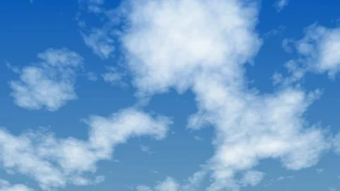 Serene clouds drift gracefully across a vast clear blue sky on a beautiful da Stock Footage 321296631