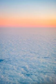 Serene Cloudscape During Sunset with Soft Pastel Hues Stock Photos