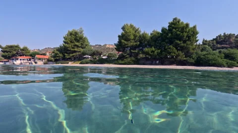 Serene Coastal Scene Under Dramatic Cloudy Sky Stock Footage 321241710