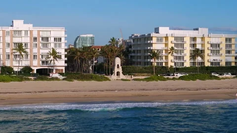 Serene coastal view of Clock Tower, Florida under clear blue sky. Multiple Stock Footage 275906912