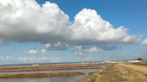 Serene Coastal View of Ocean Waves and Rocky Shoreline - Vertical Video stock 340415382