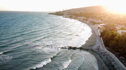 A Serene Coastal View at Sunset, showcasing the vivid colors and peaceful Stock Footage 289476512
