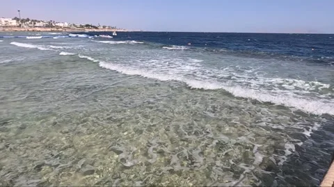 Serene Coastal Waters Captured in Two Frames: A Beautiful Display of Crystalline Stock Footage 330183267