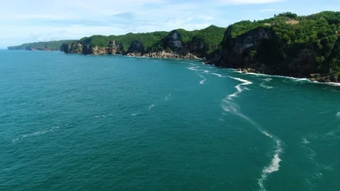 Serene coastline by Kesirat beach, Java, Indonesia, aerial view Stock Footage 152815092
