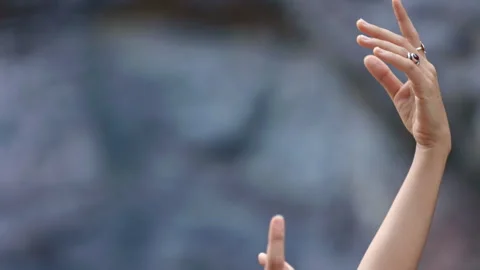 A Serene Dance of Hands: Capturing the Grace and Movement of Human Expression in Stock Footage 314393204