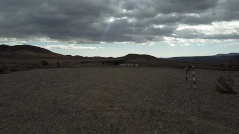 Serene desert with ominous clouds moving overhead Stock Footage 164082887