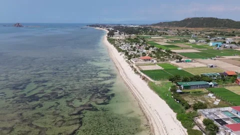 Serene Drone Pullback Revealing the Sea and Horizon – Phan Rang, Vietnam Stock-Footage 309168636