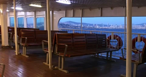Serene evening ferry ride through Istanbul Bosphorus with empty seats Stock Footage 299803406